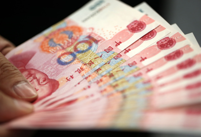 100-yuan banknotes.   Bloomberg