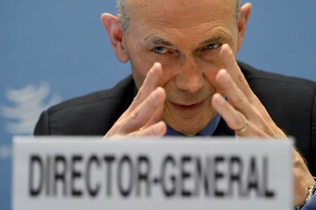WTO Director-General Pascal Lamy gestures during a press conference at WTO headquarters in Geneva on Wednesday.   AFP-Yonhap News