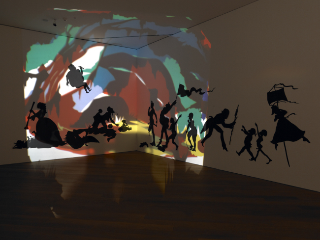 “Darkytown Rebellion,” 2001, cut paper elements, mural projection and painting by Kara Walker.   Collection Mudam Luxembourg/ArtSonje Center