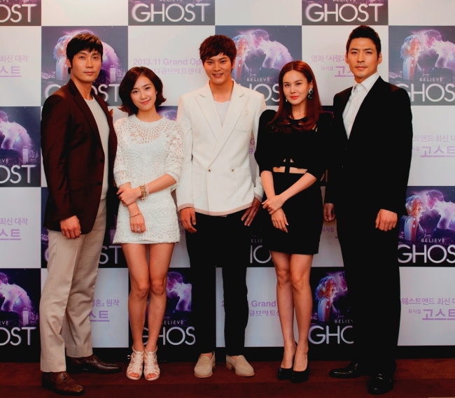 The local cast of upcoming musical “Ghost” pose for a photo during a press conference in Seoul on Monday.   Seensee Company