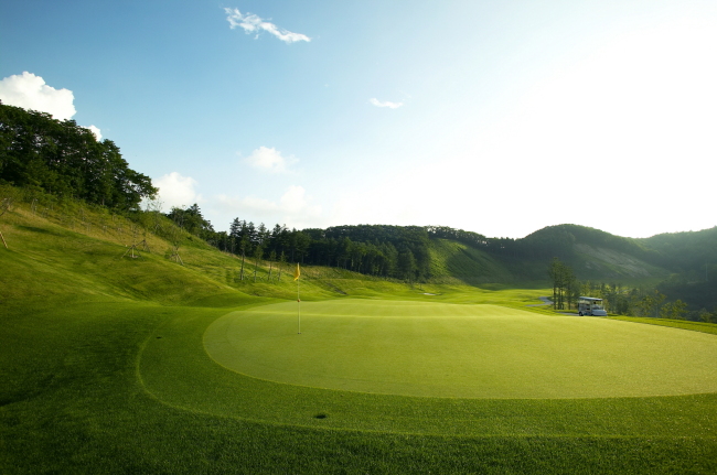 The green on one of the 18 holes at High 1 golf course