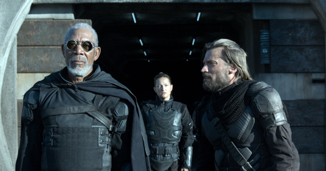 Beech (Morgan Freeman, left) gives orders to Kara (Zoe Bell, center) and Sykes (Nikolaj Koster-Waldau) in Oblivion, an original and groundbreaking cinematic event from the visionary director of “TRON: Legacy and producers of Rise of the Planet of the Apes.” (Courtesy Universal Pictures/MCT)
