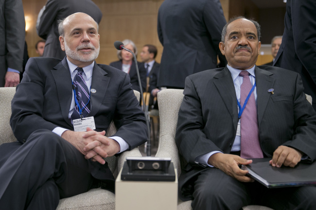 Ben S. Bernanke, chairman of the U.S. Federal Reserve, left, and Mohammed Laksaci, governor of the Bank of Algeria, attend the International Monetary and Financial Committee (IMFC) meeting during the International Monetary Fund (IMF) and World Bank Group Spring Meetings in Washington, D.C., U.S., on Saturday, April 20, 2013. The IMF's Managing Director said the euro area has the only central bank with enough leeway to take more measures to boost growth as low interest rates fail to trickle down to the region's economy. Photographer: Andrew Harrer/Bloomberg *** Local Caption *** Ben S. Bernanke; Mohammed Laksaci
Ben Bernanke.   Bloomberg