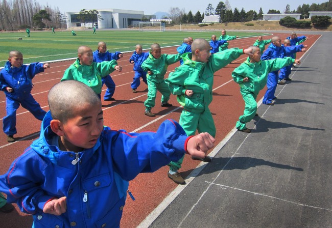 Students practice taekwondo at the Mangyongdae Revolutionary School in Pyongyang.   AP-Yonhap News