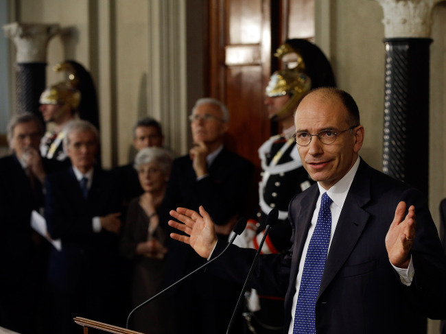 Italian Democratic Party lawmaker Enrico Letta makes his statement to the media after talks with Italian President Giorgio Napolitano in Rome’s Quirinale presidential palace, Wednesday.   AP-Yonhap News