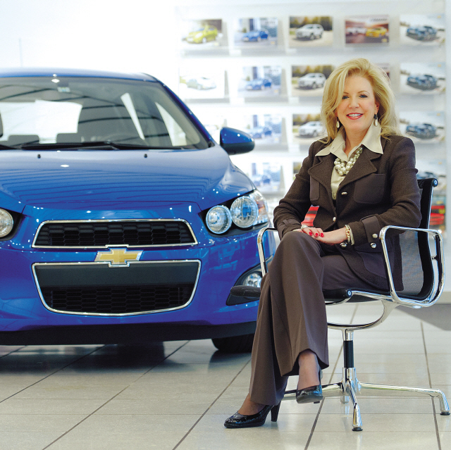 Susan Docherty, president and managing director of Chevrolet Europe, poses with the Aveo compact at GM Europe in Zurich. (GM Korea)