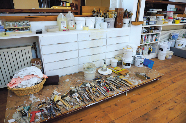 Artist Youn Myeung-ro (right), and his atelier in Pyeongchang-dong, Seoul. (Lee Woo-young/The Korea Herald)