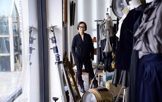 Fashion designer Moon Young Hee poses for a photo at her studio in Bangbae-dong, Seoul, during an interview with The Korea Herald on Friday.   Park Hae-mook/The Korea Herald