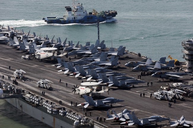 The nuclear-powered aircraft carrier USS Nimitz docks to participate in a South Korea-U.S. joint exercise in Busan on Saturday.  (Yonhap News)