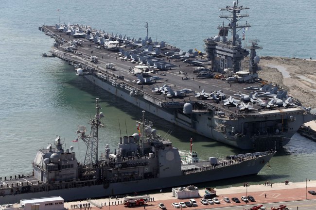The aircraft carrier USS Nimitz is anchored off a naval port in Busan on Saturday.   Yonhap News