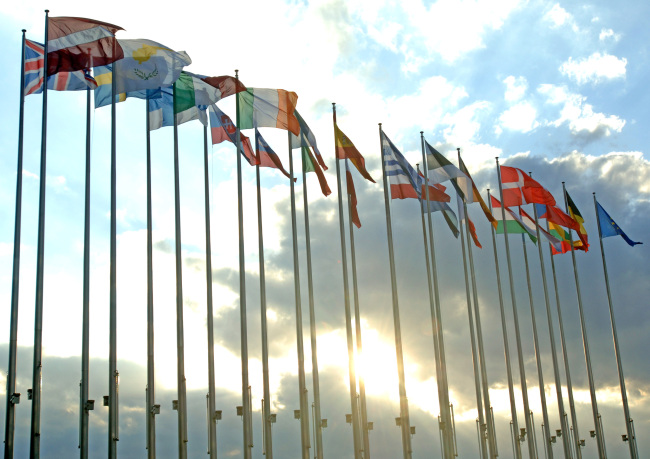 European Union member flags fly outside the Louise Weiss Building at the European Parliament in Strasbourg, France.  Bloomberg