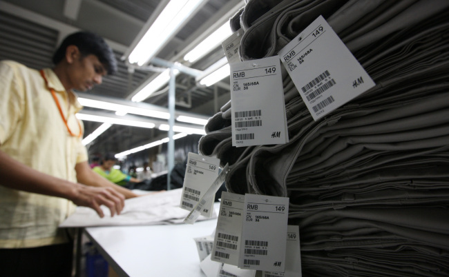Price tags are seen on clothing for H&M at the Talisman Ltd. garment factory in the export processing zone of Dhaka, Bangladesh.   Bloomberg
