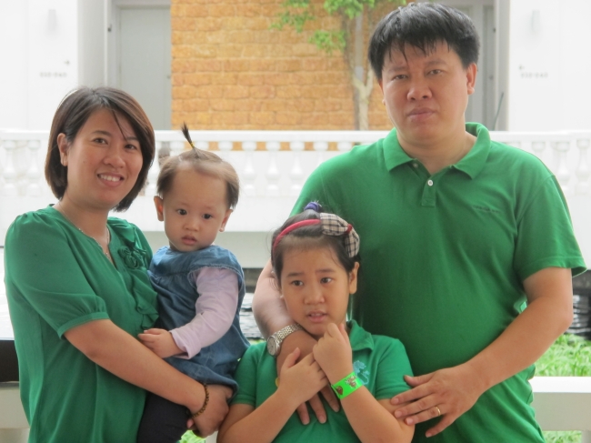 Le Quynh Nga (left) poses with her husband Thieu Van Ly and their two daughters in Vietnam.   Le Quynh Nga