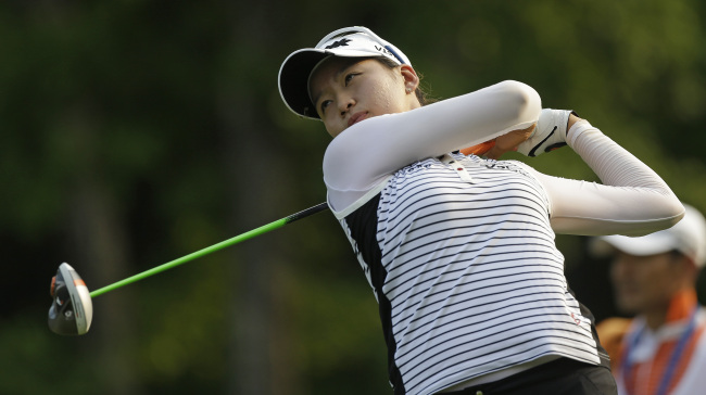 Chella Choi watches her drive on the 18th hole on Saturday.   AP-Yonhap News
