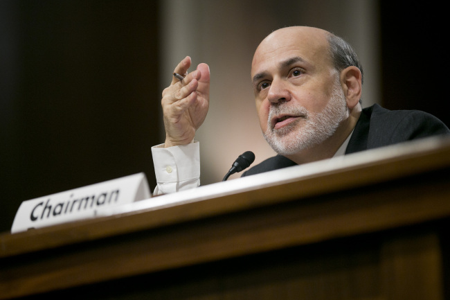 U.S. Federal Reserve chief Ben Bernanke speaks in Washington, D.C., Wednesday.   Bloomberg