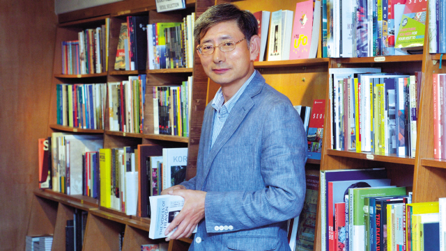 Publisher Hank Kim says he often feels like Don Quixote, the famous fictional Spaniard with reckless enthusiasm and big dreams.