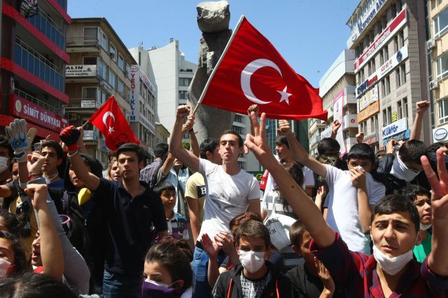 Protesters shout antigovernment slogans during a demonstration in Ankara on Tuesday.   AFP-Yonhap News