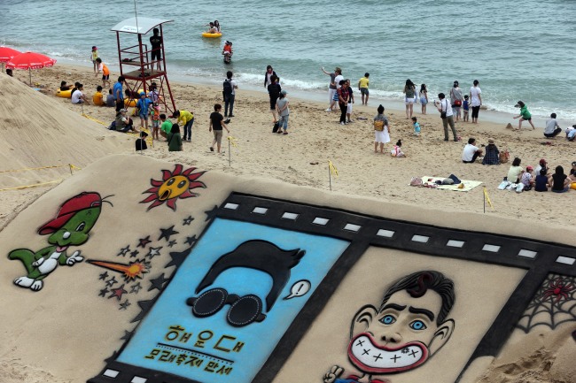 Sand art is shown on Haeundae Beach, Busan, ahead of Friday’s opening of the Haeundae Sand Festival. (Yonhap News)