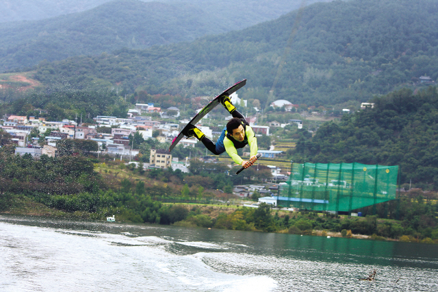 A wakeboard club member performs an aerial trick. (D.Island)