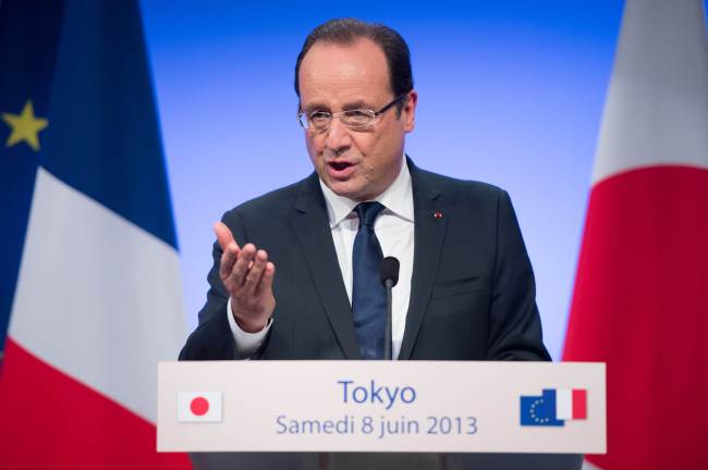 France’s President Francois Hollande delivers a speech during a press conference at the French Institute in Tokyo on Saturday.   AFP-Yonhap News