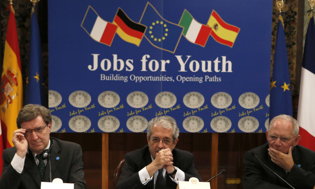 Enrico Giovannini, Italy’s labor minister (from left), Fabrizio Saccomanni, Italy’s finance minister, and Wolfgang Schaeuble, Germany’s finance minister, attend a news conference following a youth unemployment summit at Chigi palace in Rome on Friday.   Bloomberg