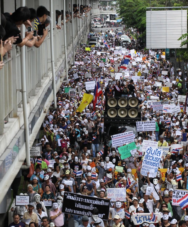 Antigovernment demonstrators march during a rally in Bangkok, Thailand.   AP-Yonhap News