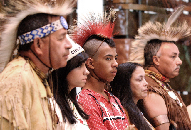 In this file photo, Virginia Native American chiefs lead a delegation of 60 Virginia Native Americans in a departure ceremony on July 12, 2006 before making the first official visit by Virginia Indians to the United Kingdom in more than 230 years to visit the burial site of Pocahontas.    MCT