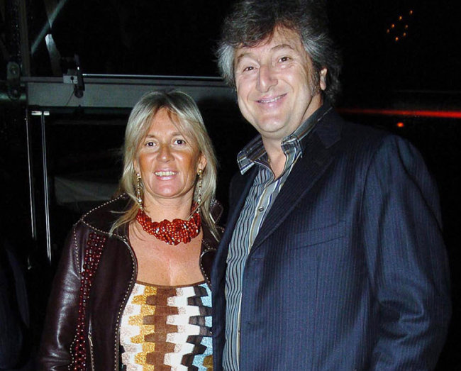 In this March 30, 2005 file photo, Vittorio Missoni (right) and his wife Maurizia Castiglioni pose for a photo in Milan, Italy.