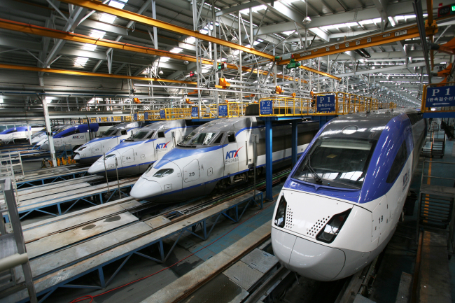 High-speed KTX-Sancheon trains, built by Hyundai Rotem and operated by KORAIL, are lined up in an engine shed.   KORAIL