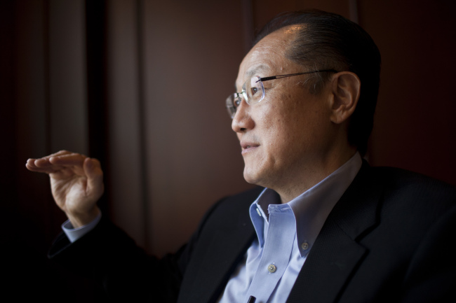Jim Yong Kim, president of the World Bank Group, speaks during an interview in Lima, Peru, Sunday.   Bloomberg