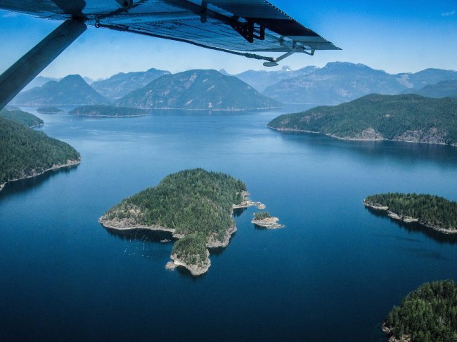 CorilAir pilot Mike Farrell flies low over the Discovery Islands, east of Campbell River, Vancouver Island, British Columbia. (ColorWorld/MCT)