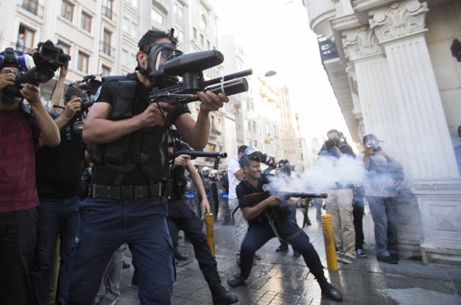 Police fire tear gas at protesters during clashes in Istanbul, Turkey, Monday.   AP-Yonhap News