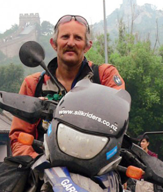 This picture from the blog of Gareth Morgan shows him posing for a photo during his motorcycle travels in China in 2005.   Yonhap News