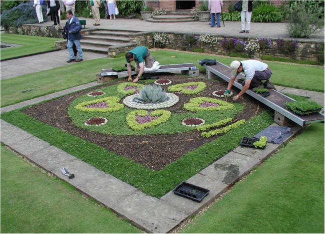 Trainees at Britain’s Royal Horticultural Society help create a botanical
garden.  KFS
