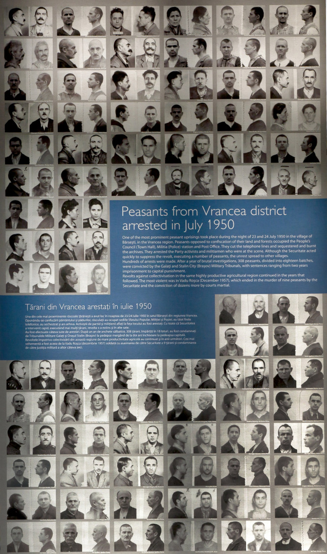 In this May 9 photo, pictures of deportees and prisoners appear on display, in Bucharest, Romania, at the opening of a permanent memorial exhibition for the victims of the communist regime persecutions.   AP-Yonhap News