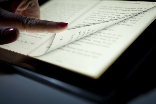 A digital book is displayed on an Apple Inc. iPad in New York.   Bloomberg