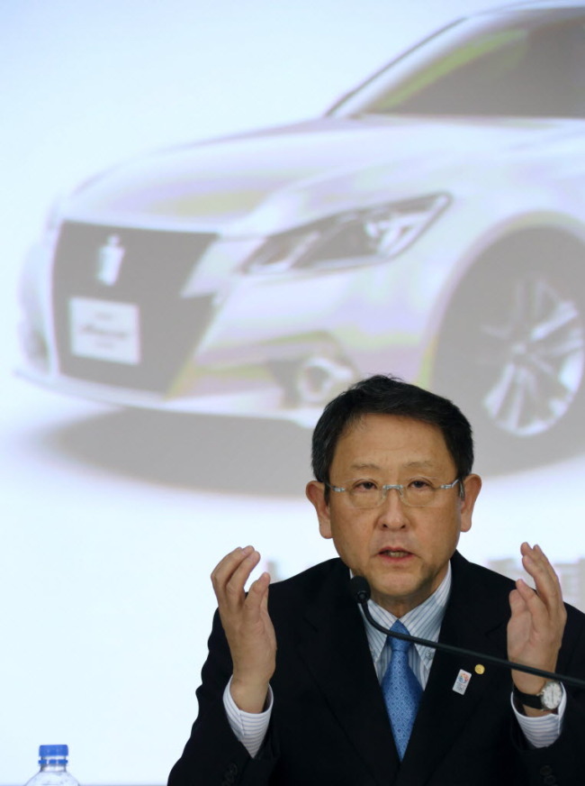 Akio Toyoda, president of Toyota Motor Corp., speaks during a news conference in Tokyo.    Bloomberg