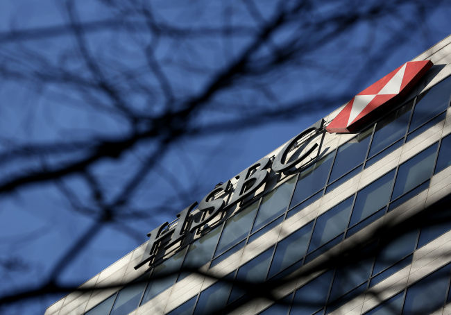HSBC Holdings Plc. signage is displayed atop the HSBC Building in Seoul.   Bloomberg