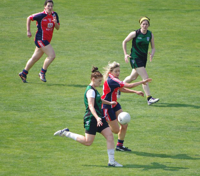 A Laochra Busan player tries to block a kick by a Seoul Gaels player.   Seoul Gaels