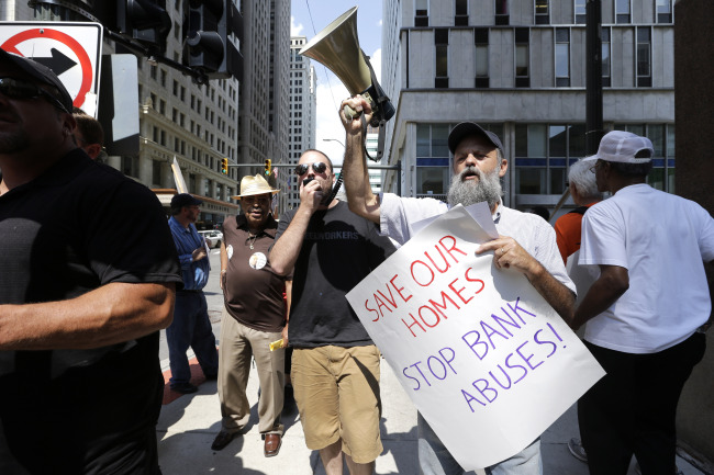 Protesters rally in downtown Detroit on Monday.   AP-Yonhap News