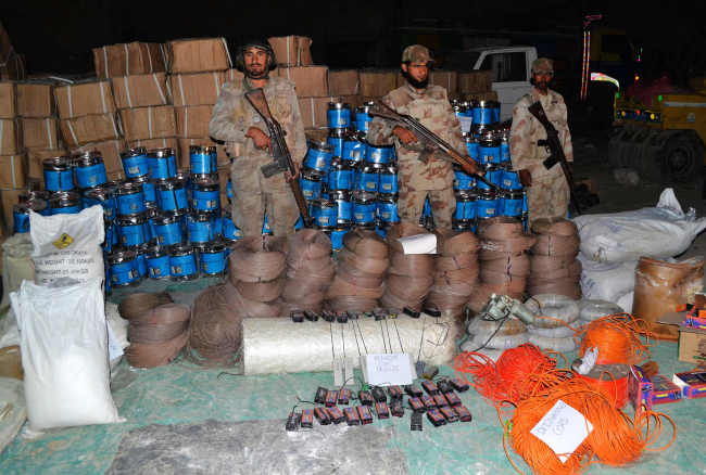Pakistani paramilitary soldiers display seized bomb-making material in southwestern Pakistan’s Quetta on Tuesday.   Xinhua-Yonhap News