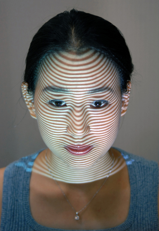 A patient’s face is scanned prior to plastic surgery at a clinic in Seoul.   Bloomberg