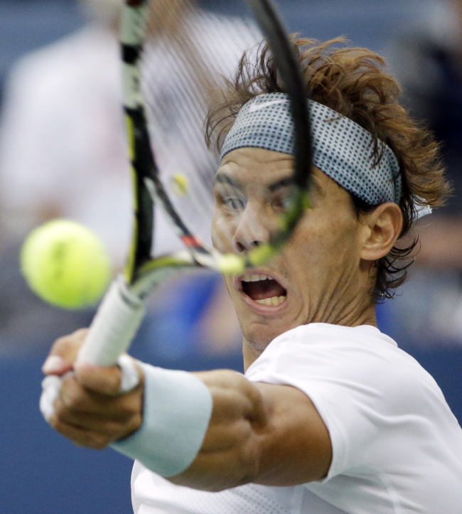 Rafael Nadal returns a shot against Richard Gasquet.   AP-Yonhap News
