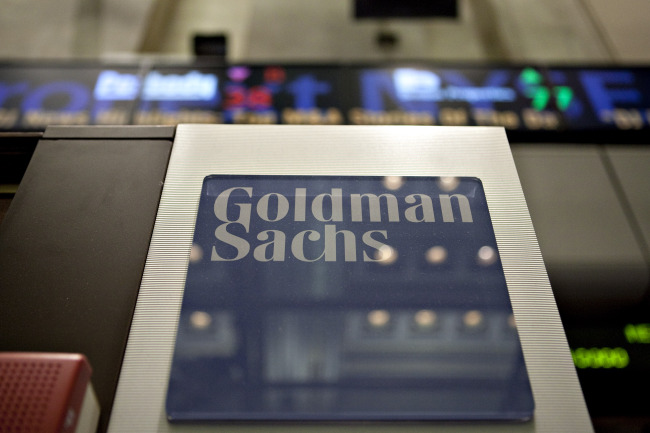 A Goldman Sachs Group Inc. logo hangs on the floor of the New York Stock Exchange in New York.   Bloomberg
