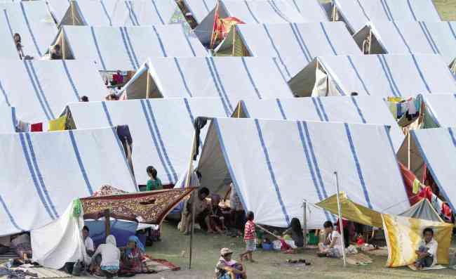 More than 44,000 of the 68,000 people displaced by fighting between government forces and MNLF rebels have taken refuge at Joaquin F. Enriquez Memorial Sports Complex.   Inquirer