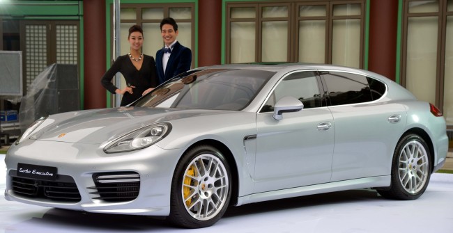 Stuttgart Sports Cars, the official importer of Porsche vehicles in Korea, unveils nine models of the new Panamera sports sedan, including the Turbo Executive trim, shown here, during an event held at Hotel Shilla in central Seoul on Tuesday.   Kim Myung-sub/The Korea Herald