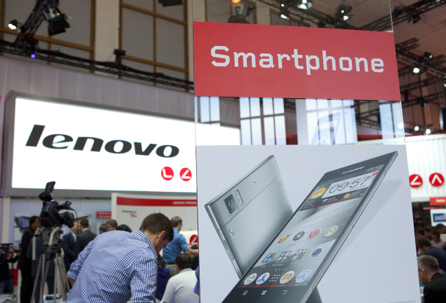 An advertisement hoarding for a K900 smartphone, manufactured by Lenovo Group Ltd., stands on display during the IFA consumer electronics show in Berlin on Sept. 5.   (Bloomberg)