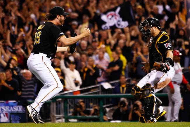 Pirates pitcher Jason Grilli (left) and catcher Russell Martin celebrate after the final out at PNC Park on Tuesday.   AFP-Yonhap News