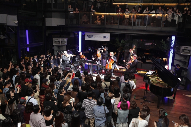 The Philharmonics members perform at the Yellow Lounge concert at Club Octagon in southern Seoul on Oct. 3.   Universal Music