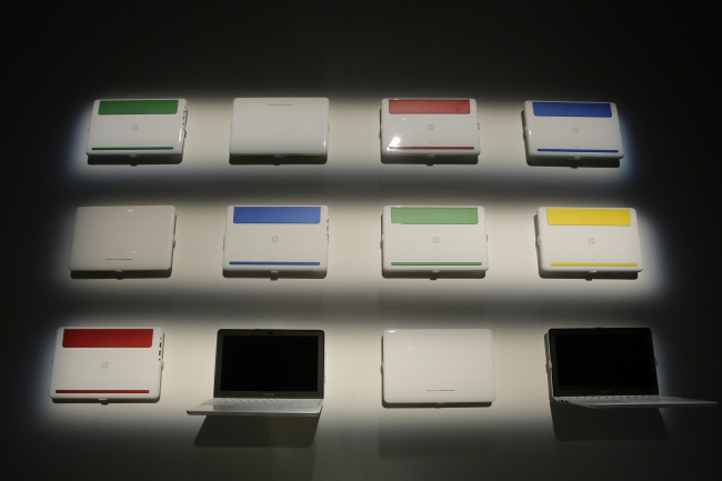 New HP Chromebook 11s are displayed at a Google event in New York on Tuesday.    (AP-Yonhap News)